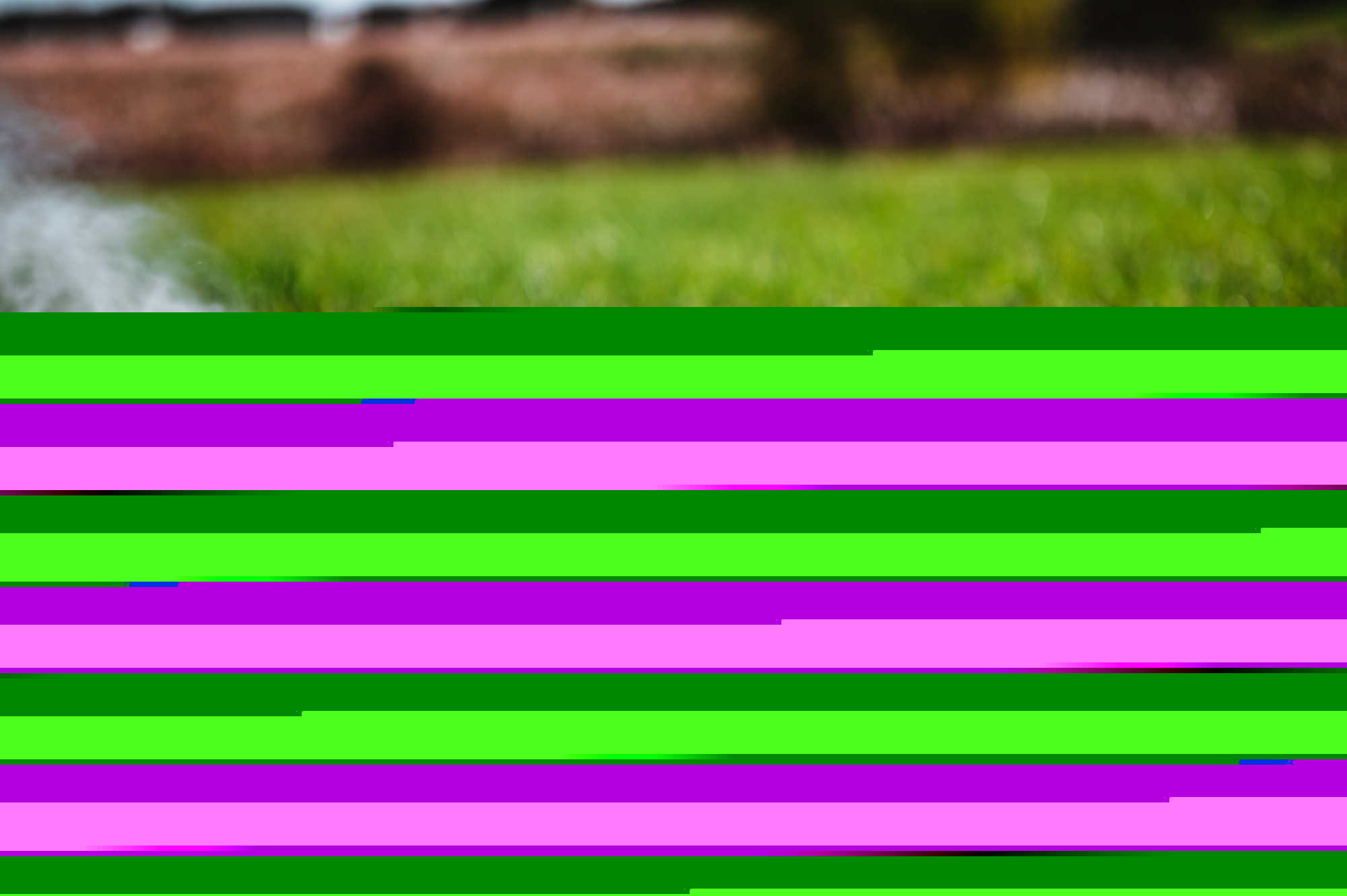 Commercial irrigation sprinkler system running on office park turf in Spokane Valley, WA